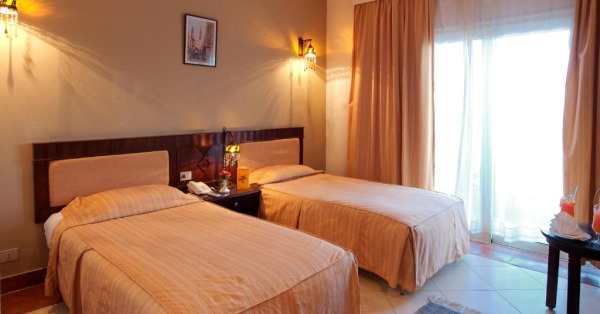 Falcon Naama Star Hotel - hotel room